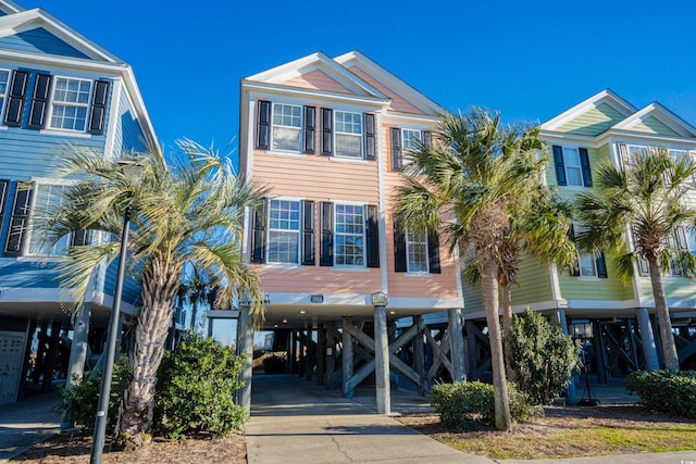 2022 N Waccamaw Dr, Garden City Beach, SC 29576 - coastal home with a carport