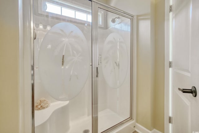 bathroom with a stall shower