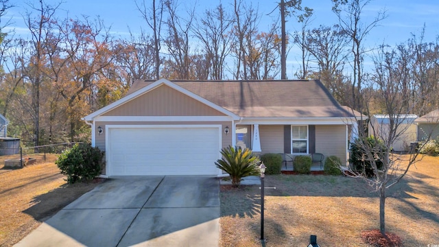 ranch-style home with driveway, a porch, an attached garage, and fence