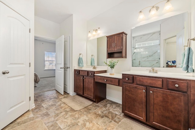 bathroom with vanity and walk in shower