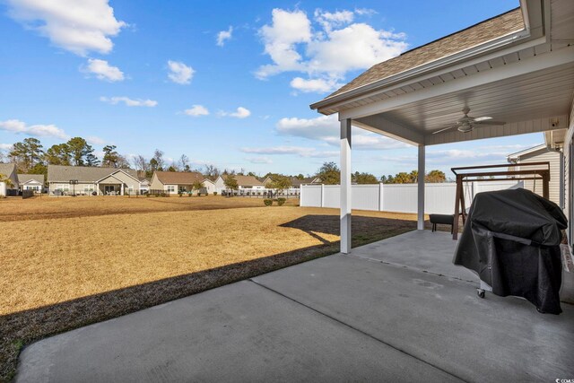 view of patio / terrace with a grill and ceiling fan