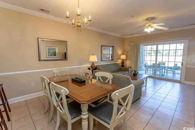 tiled dining area featuring crown molding and ceiling fan with notable chandelier