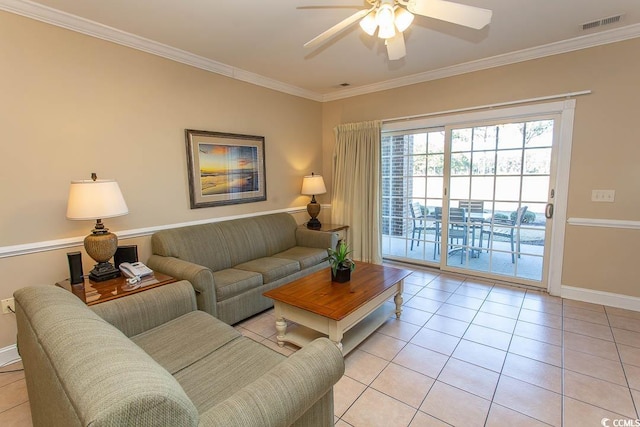 living room with ornamental molding, ceiling fan, and light tile patterned flooring