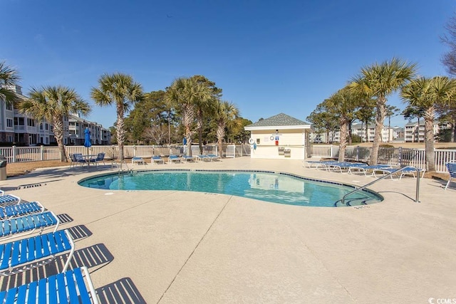 view of swimming pool featuring a patio