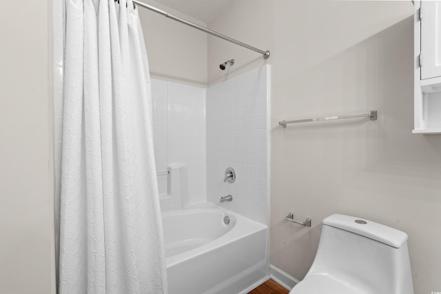 bathroom with shower / bath combination with curtain