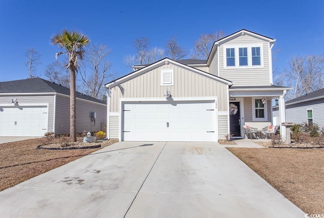 view of front of home featuring a garage and covered porch