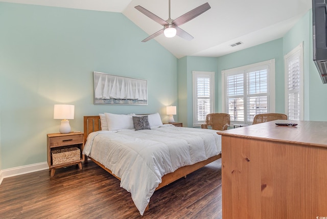 bedroom with vaulted ceiling, dark hardwood / wood-style floors, and ceiling fan