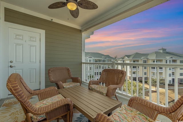 balcony at dusk with ceiling fan