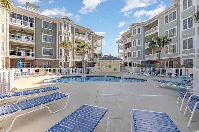 view of swimming pool with a patio