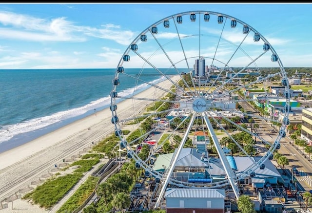 bird's eye view with a water view and a view of the beach