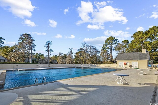 view of pool with a patio area