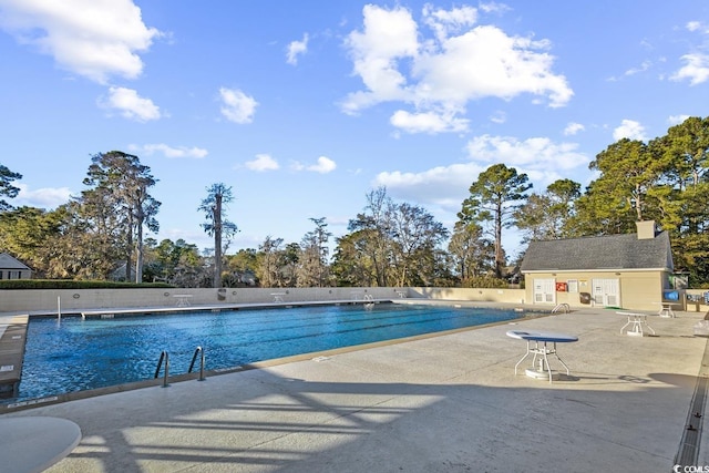 pool featuring a patio