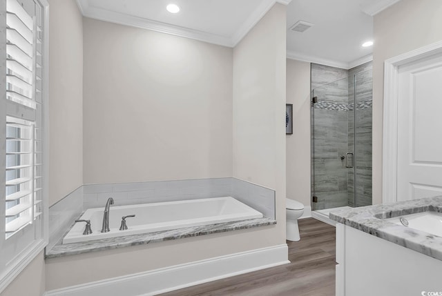 full bathroom with crown molding, hardwood / wood-style flooring, vanity, independent shower and bath, and toilet