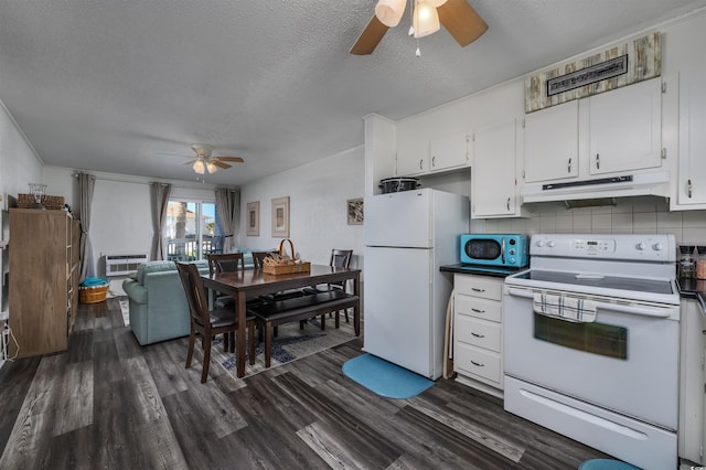 kitchen featuring white cabinetry, dark hardwood / wood-style floors, white appliances, and decorative backsplash