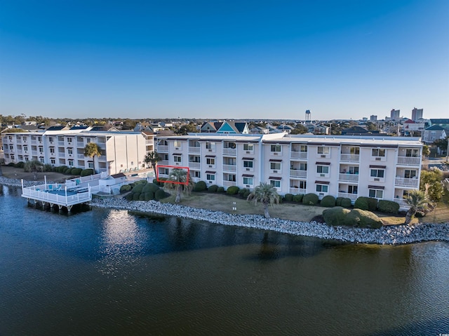 birds eye view of property featuring a water view