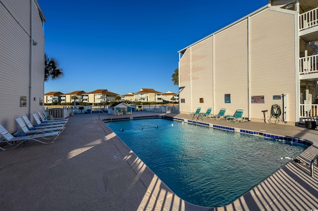 view of swimming pool featuring a patio