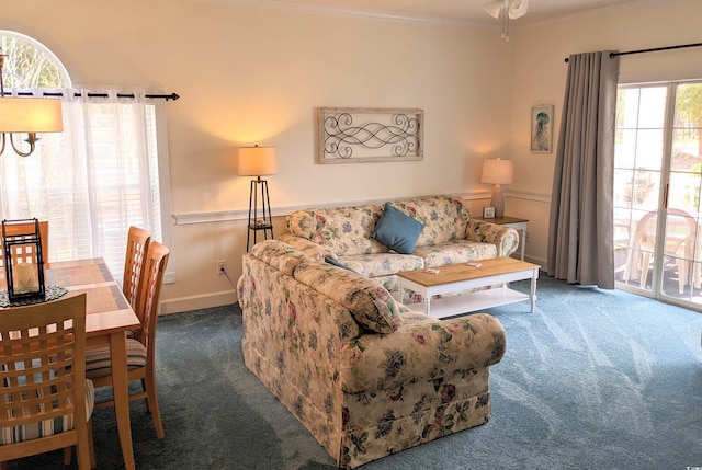 carpeted living room with ornamental molding