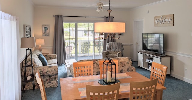 carpeted dining space featuring ornamental molding and ceiling fan