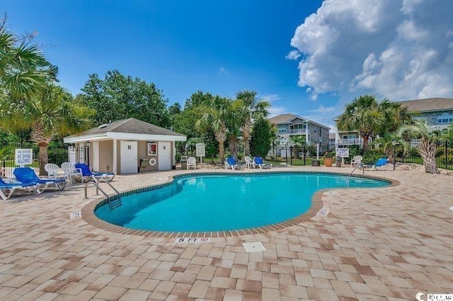 view of pool featuring a patio