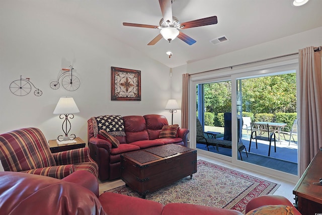 living room with vaulted ceiling and ceiling fan