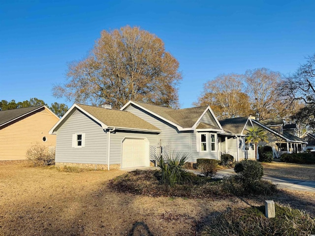 view of front of home featuring a garage