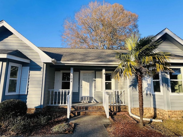 view of front of home featuring covered porch