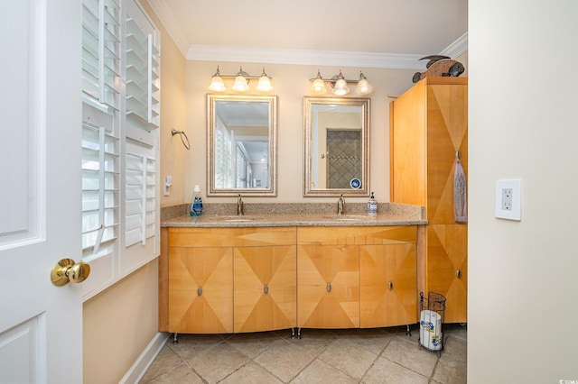 bathroom featuring double vanity, ornamental molding, and a sink