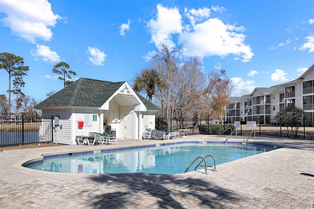 view of pool featuring a patio area