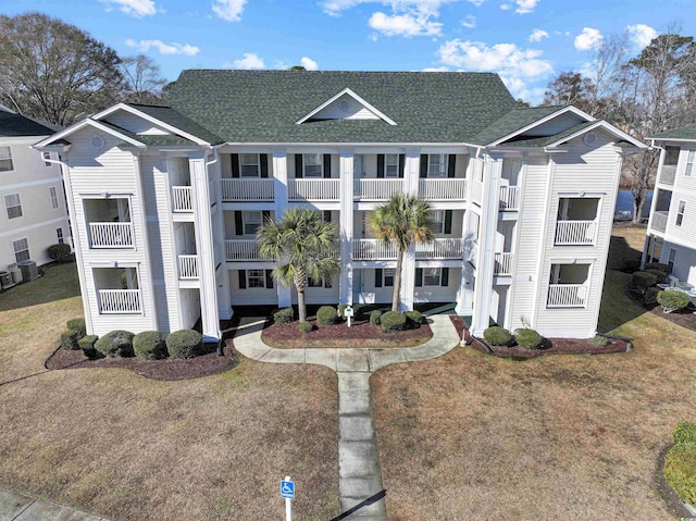 view of property featuring central AC unit