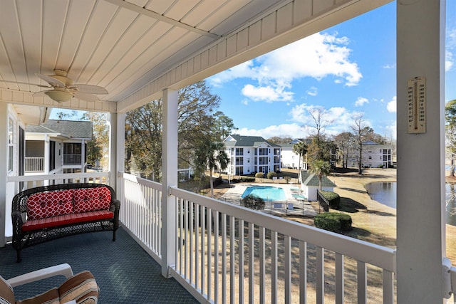 balcony featuring ceiling fan