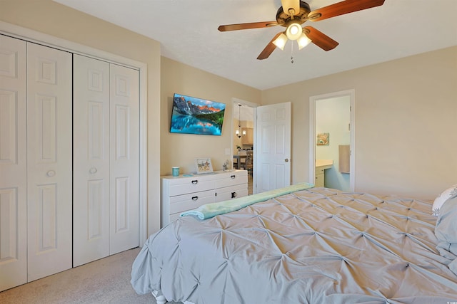 bedroom with light carpet, ceiling fan, and a closet