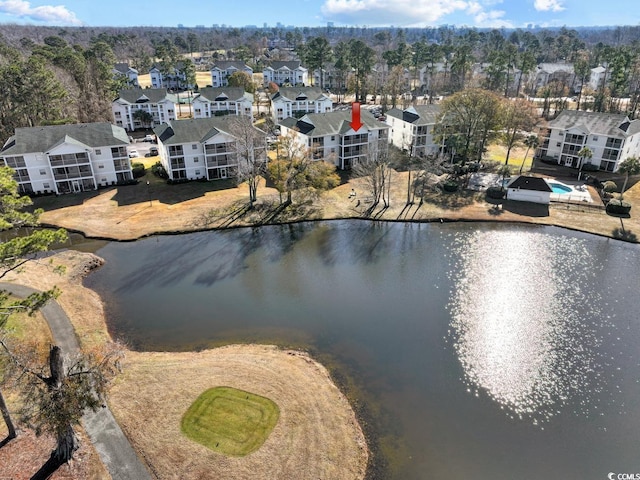 drone / aerial view with a water view