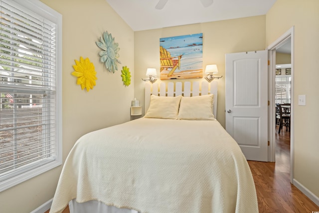 bedroom featuring ceiling fan and wood-type flooring