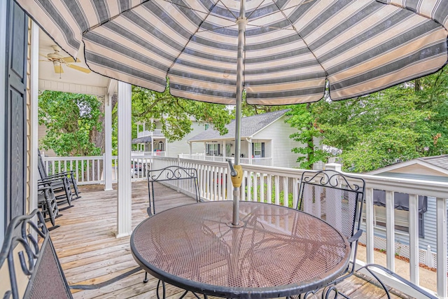 wooden deck with ceiling fan