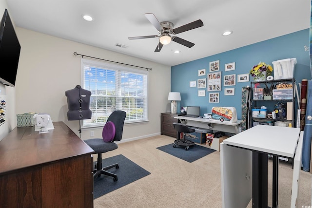 home office with light colored carpet and ceiling fan