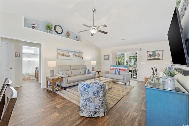 living room featuring ceiling fan, lofted ceiling, and dark hardwood / wood-style flooring