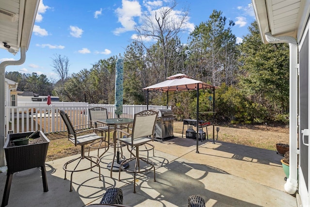 view of patio / terrace featuring a gazebo and area for grilling