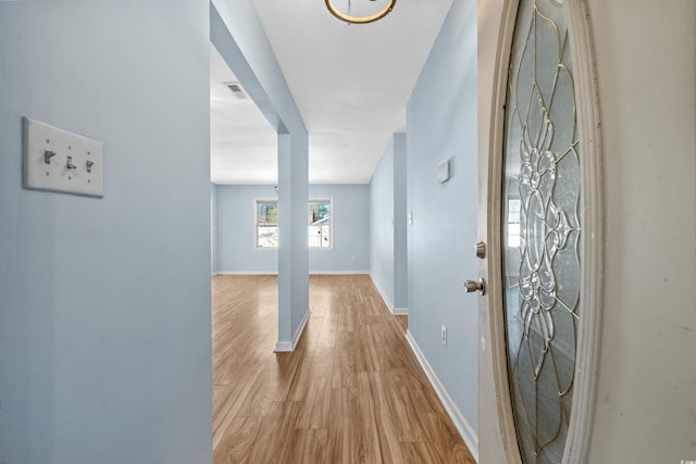 hall featuring light hardwood / wood-style flooring