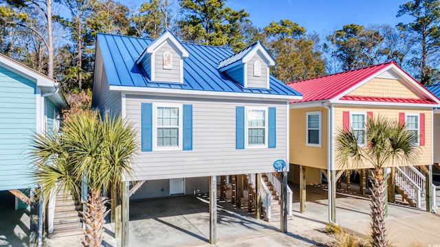 view of front of home with a carport