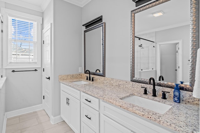 bathroom with crown molding, a tile shower, and vanity