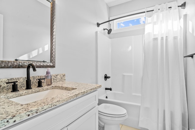 full bathroom featuring vanity, shower / tub combo, and toilet