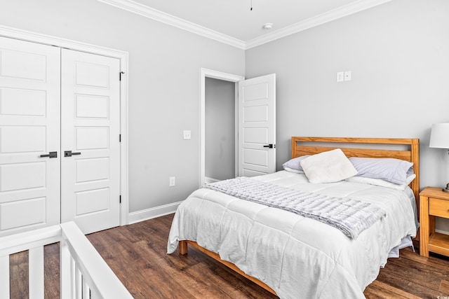 bedroom featuring crown molding, dark hardwood / wood-style flooring, and a closet