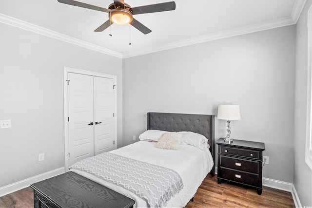 bedroom with ceiling fan, ornamental molding, dark hardwood / wood-style flooring, and a closet