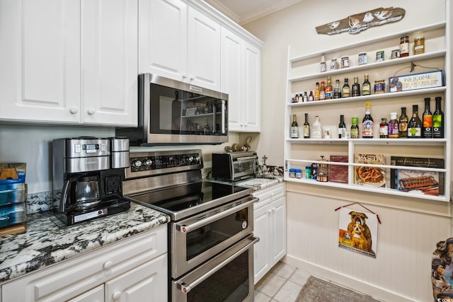 489-3 Golden Bear Dr Unit 3, Pawleys Island, SC 29585 - kitchen with stainless steel appliances, white cabinets, open shelves, crown molding, and light tile patterned floors