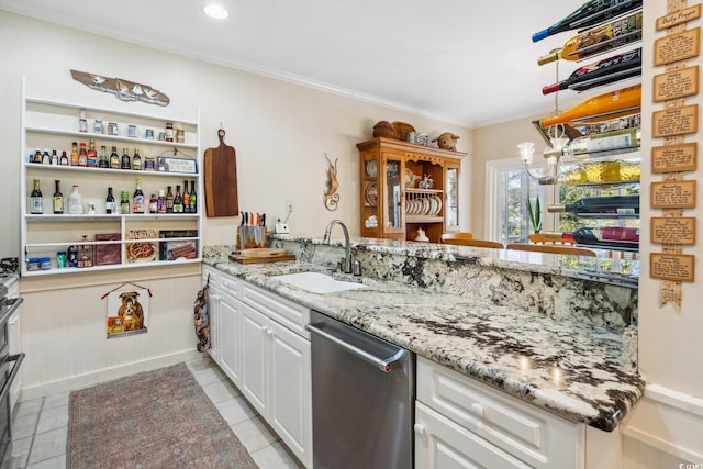 489-3 Golden Bear Dr Unit 3, Pawleys Island, SC 29585 - kitchen with stainless steel dishwasher, white cabinetry, ornamental molding, light stone countertops, and recessed lighting