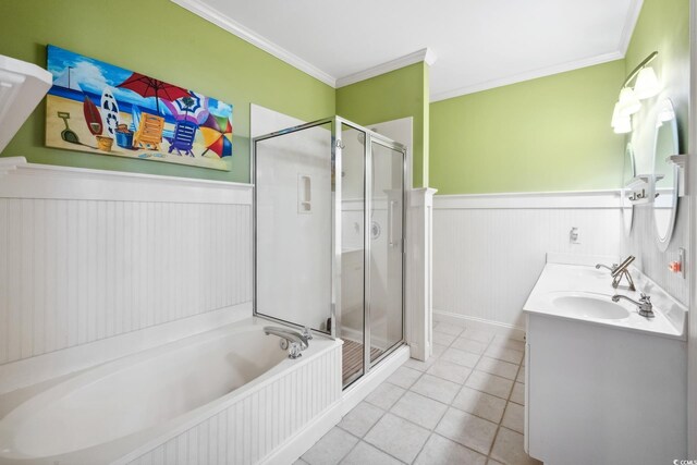 489-3 Golden Bear Dr Unit 3, Pawleys Island, SC 29585 - bathroom with wainscoting, a stall shower, tile patterned floors, a garden tub, and ornamental molding