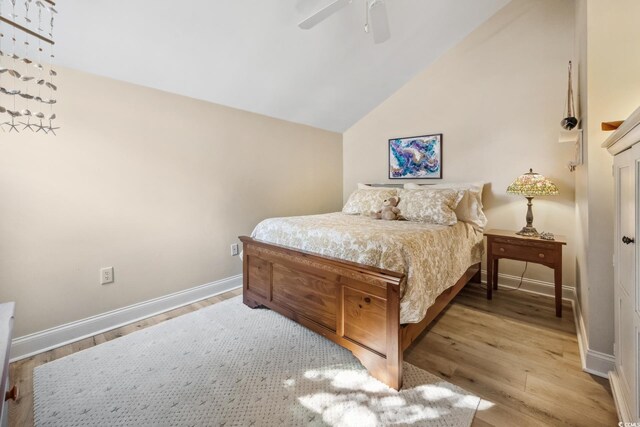489-3 Golden Bear Dr Unit 3, Pawleys Island, SC 29585 - bedroom featuring light wood-style floors, lofted ceiling, and ceiling fan