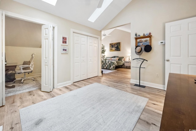 489-3 Golden Bear Dr Unit 3, Pawleys Island, SC 29585 - foyer featuring a skylight, wood finished floors, high vaulted ceiling, and ceiling fan