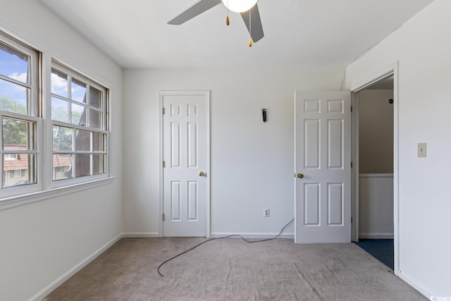 1025 Carolina Rd Unit I-7, Conway, SC 29526 - unfurnished bedroom featuring carpet floors, baseboards, and ceiling fan