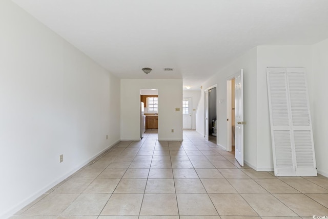 1025 Carolina Rd Unit I-7, Conway, SC 29526 - empty room featuring light tile patterned floors and baseboards